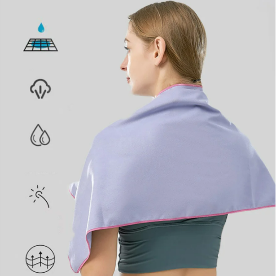 Woman with microfibre towel around neck, compact quick dry sports towel for gym use