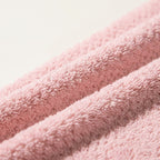 Close up of waffle texture microfibre hair towel showing soft absorbent fabric