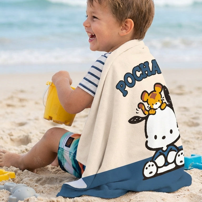 microfibre puppy print beach towel used by child on beach