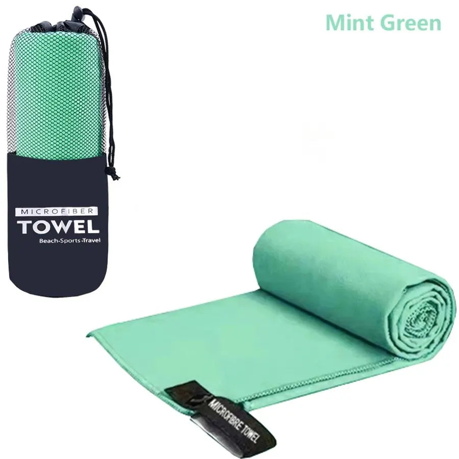 Mint green microfibre towel with carry bag, lightweight quick dry fitness towel