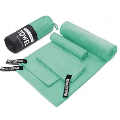 Complete 3-piece Mint Green microfibre towel set laid flat, showing all three sizes and the matching carry bag.