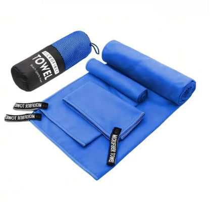 Complete 3-piece Royal Blue microfibre towel set laid flat, showing all three sizes and the matching carry bag.