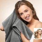 woman using microfibre hair towel wrap after shower